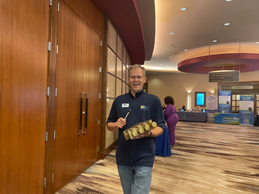 Man playing chimes at BCI Transition Conference