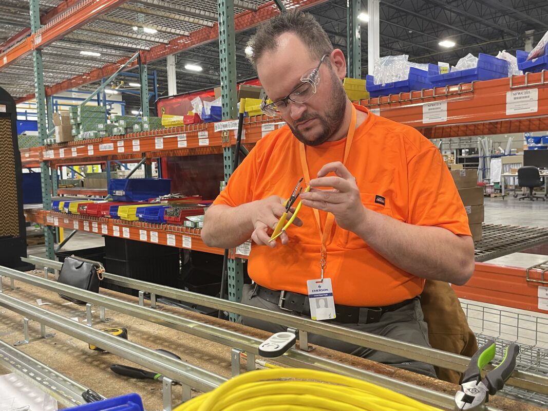 Young man with disability in job training